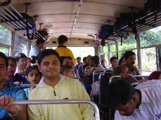 On an Accenture Blue Bus